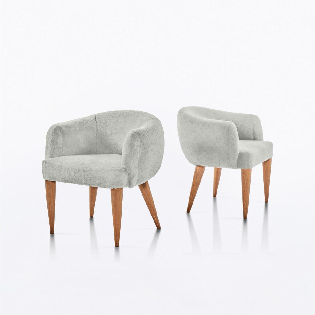 View full screen - View 1 of Lot 557. Pair of "Boule" Armchairs.