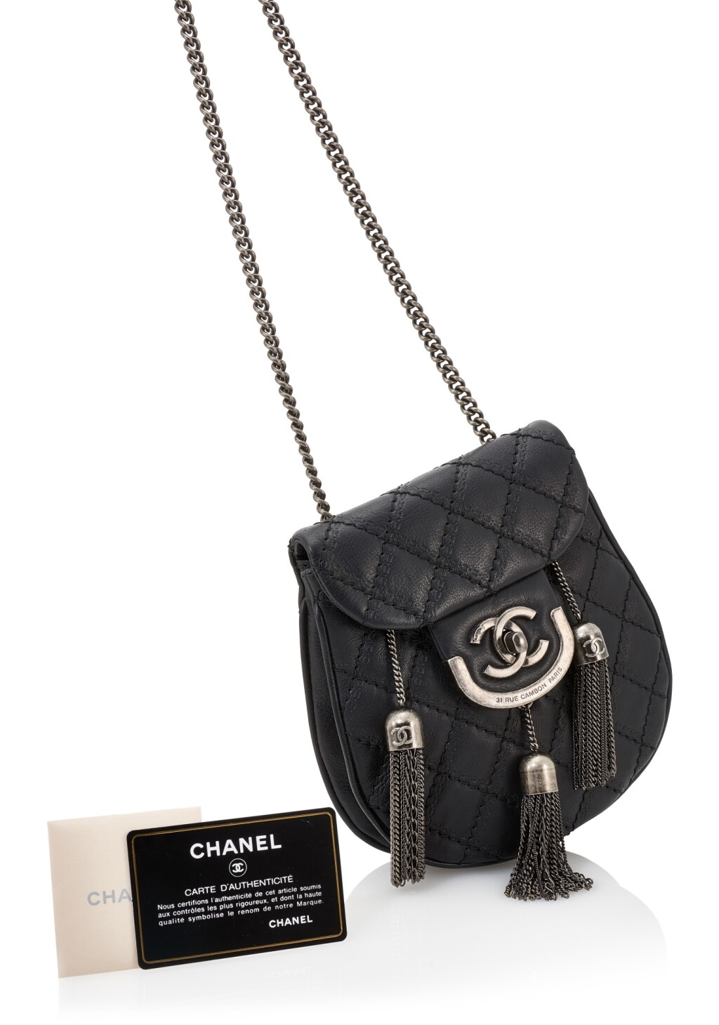 View full screen - View 1 of Lot 104. BLACK LEATHER SPORRAN WITH AGED SILVER-TONE METAL TASSEL FLAP SHOULDER BAG, CHANEL.