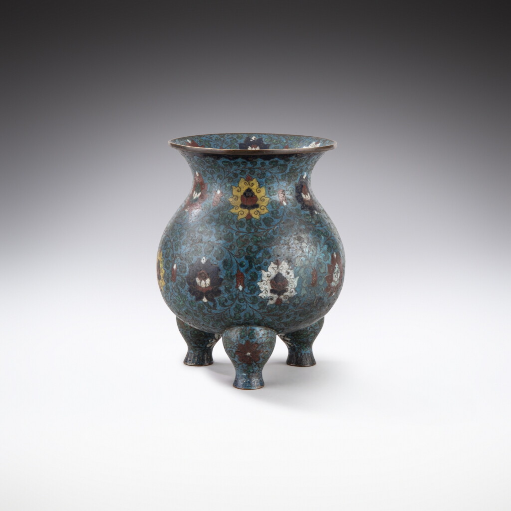 View full screen - View 1 of Lot 43. A cloisonné enamel tripod ‘lotus’ censer, Qing dynasty | 清 掐絲琺瑯纏枝蓮紋三足爐.