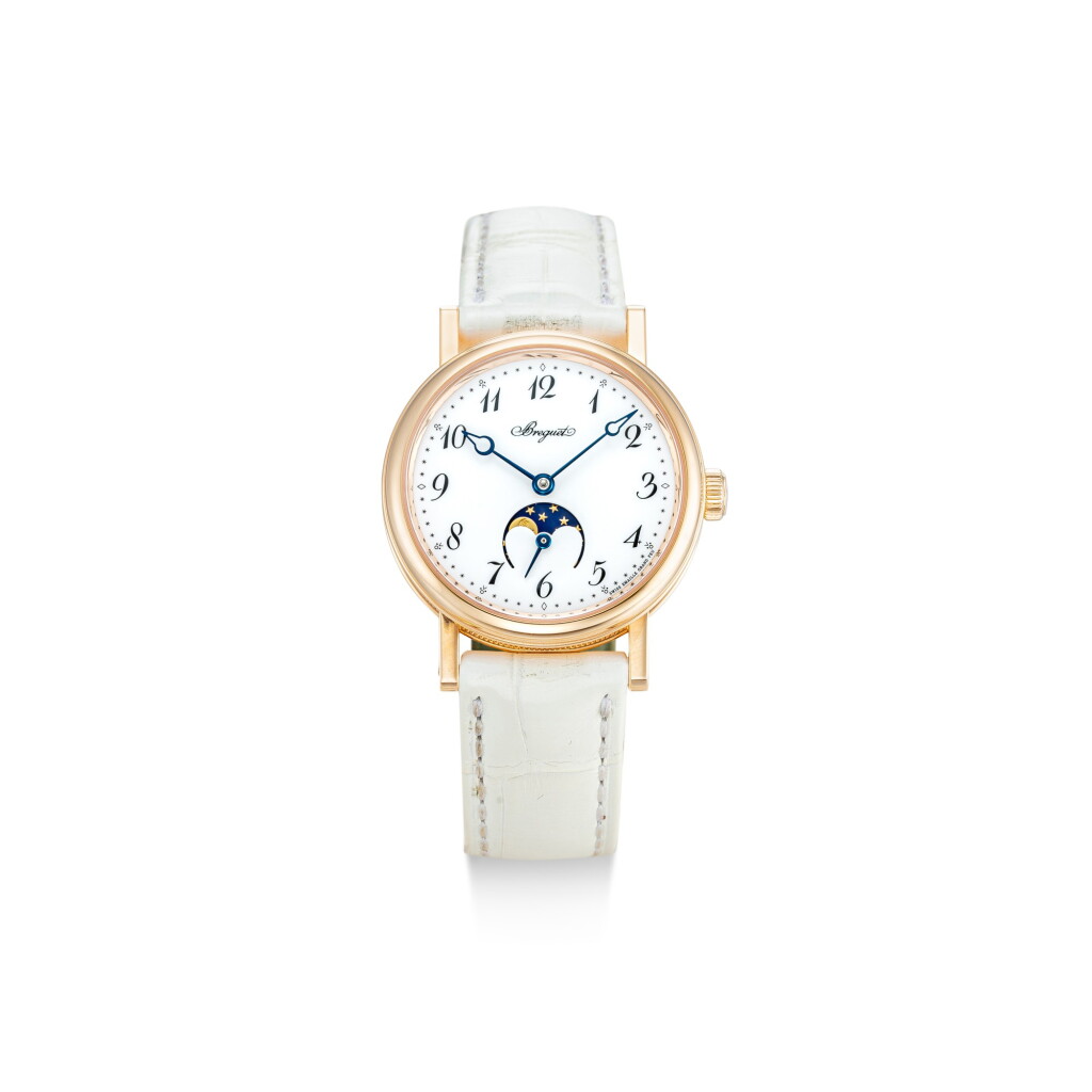 View full screen - View 1 of Lot 614. BREGUET | CLASSIQUE, REFERENCE 9087 A PINK GOLD WRISTWATCH WITH MOON PHASES AND ENAMEL DIAL, CIRCA 2019.