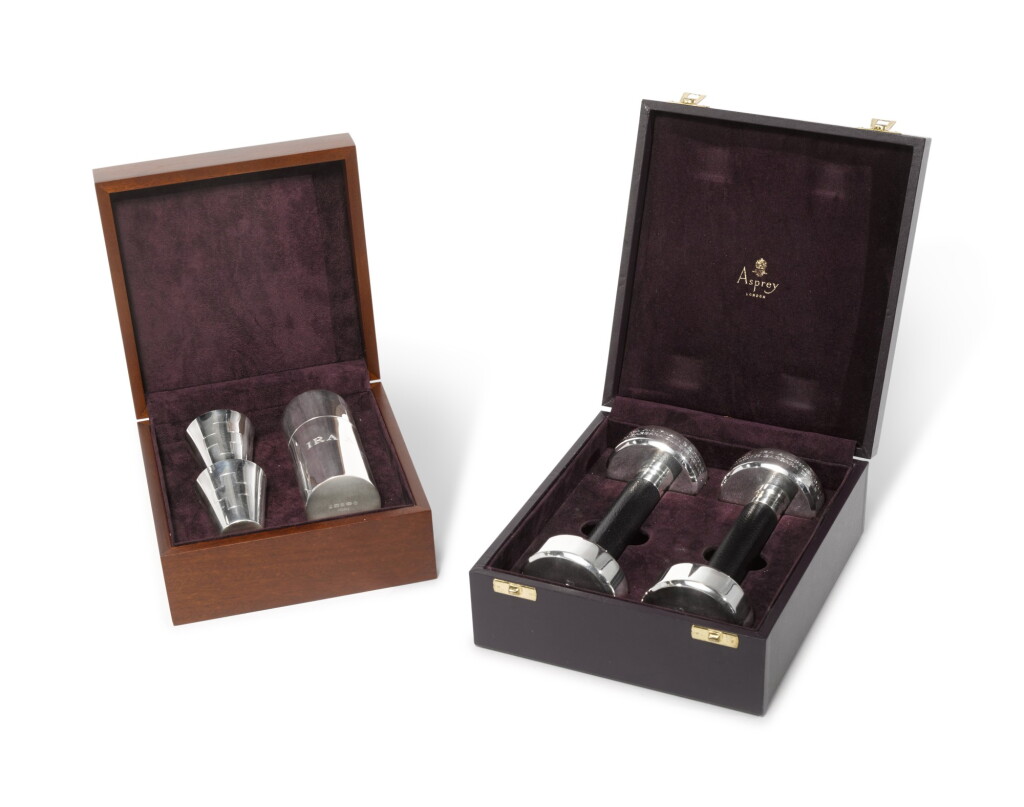 View full screen - View 1 of Lot 287. An English Silver "Thirst Aid" Kit and a Pair of Weights, Asprey, London, 2016 and 1997.