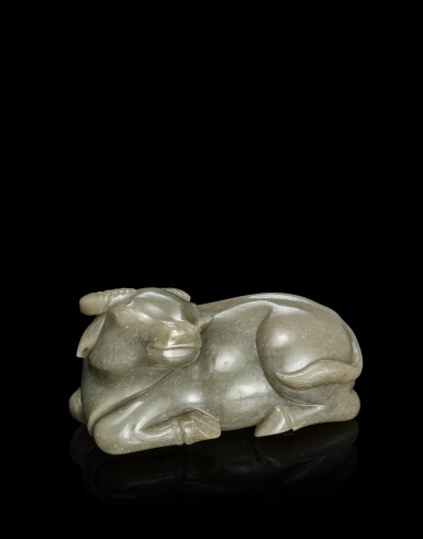 View full screen - View 1 of Lot 3915. A greyish-green jade figure of a buffalo, Qing dynasty, 18th - 19th century | 清十八至十九世紀 青玉臥牛.