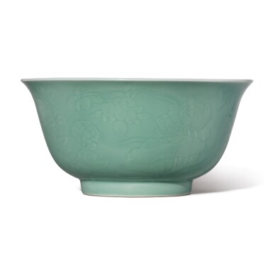 View full screen - View 1 of Lot 532. A FINE LARGE MOLDED CELADON-GLAZED BOWL, QIANLONG SEAL MARK AND PERIOD.