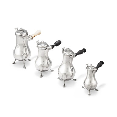 View full screen - View 1 of Lot 448. A group of four silver tripod coffee-pots, France, late 18th century | Groupe de quatre verseuses tripodes en argent, France, fin XVIIIe siècle.