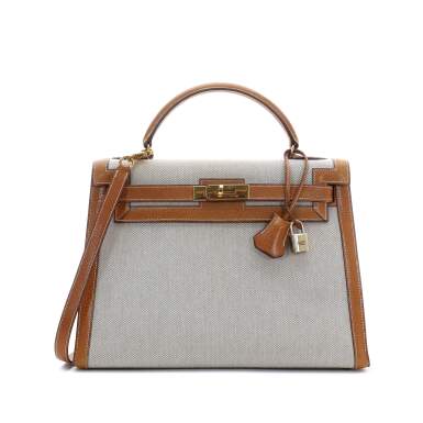 View full screen - View 1 of Lot 720. Gold and Natural Peau Porc and Toile Sellier Kelly 32 Gold Hardware, 1993.