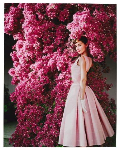 View full screen - View 1 of Lot 47. NORMAN PARKINSON | AUDREY HEPBURN WITH FLOWERS II, 1955.