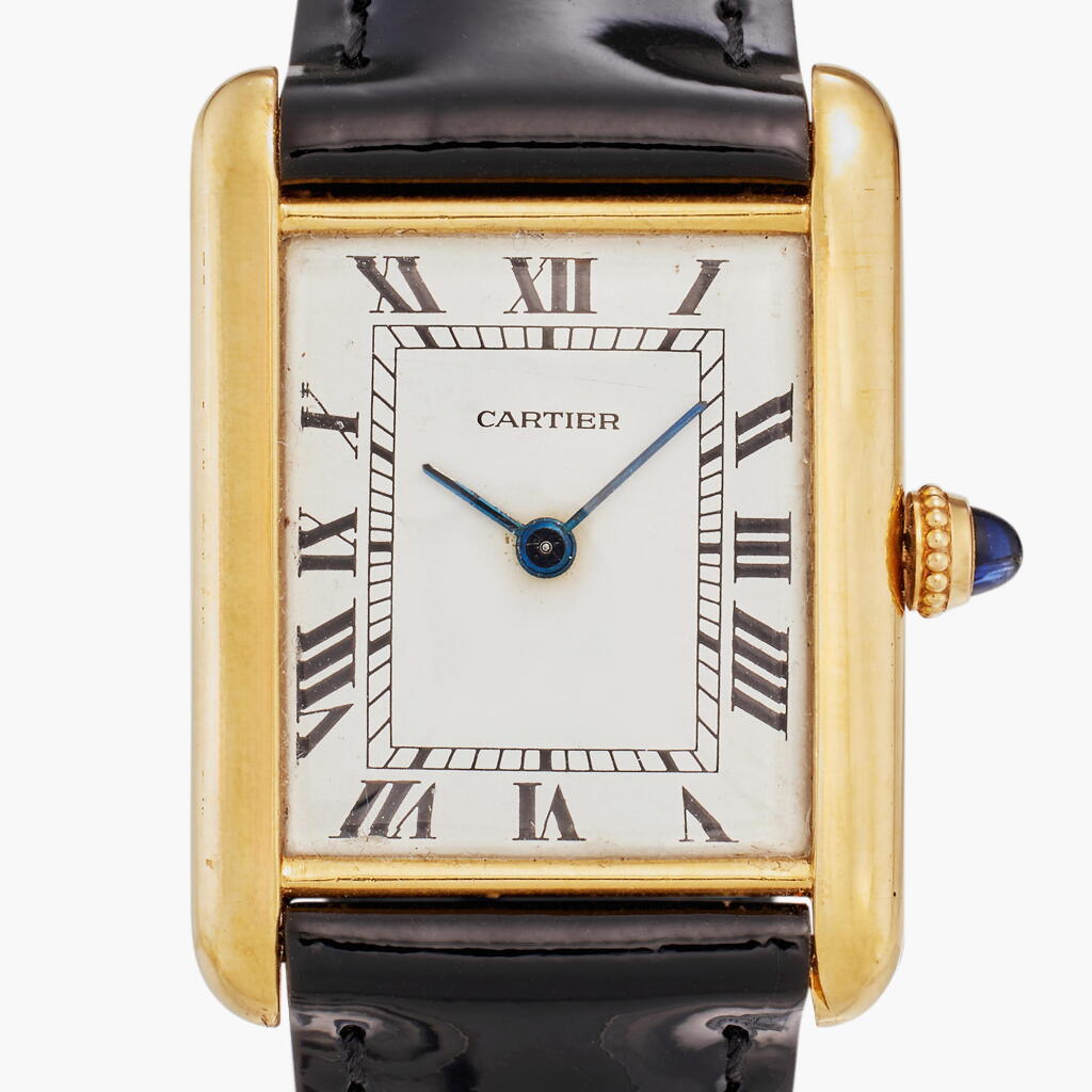View full screen - View 1 of Lot 109. Tank Louis Cartier Extra Flat | A rare and slim yellow gold rectangular wristwatch with gold deployant buckle, 1977-78.