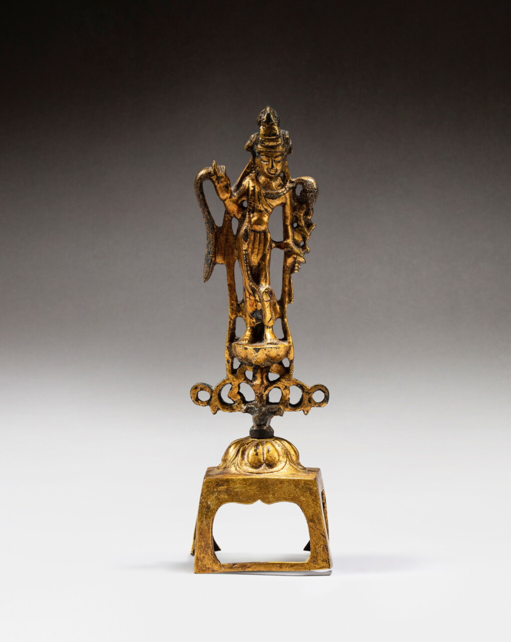 View full screen - View 1 of Lot 49. A gilt-bronze figure of Avalokiteshvara, probably Tang dynasty | 或唐 鎏金銅觀世音菩薩立像.