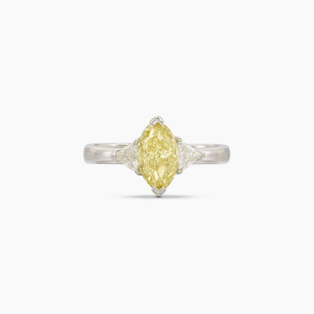 View full screen - View 1 of Lot 128. Fancy Intense Yellow Diamond and Diamond Ring .
