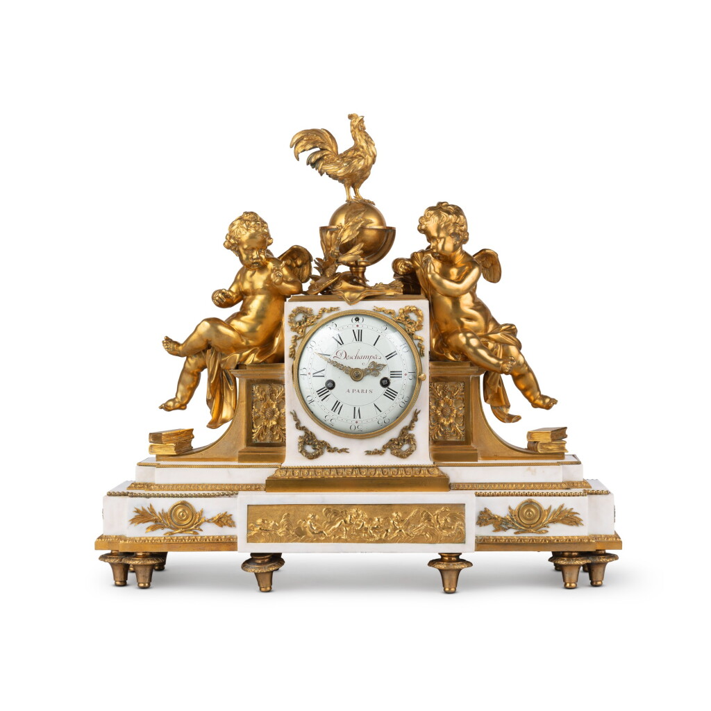View full screen - View 1 of Lot 55. A Louis XVI gilt bronze and white marble mantel clock | Pendule de cheminée en bronze doré et marbre blanc d'époque Louis XVI.