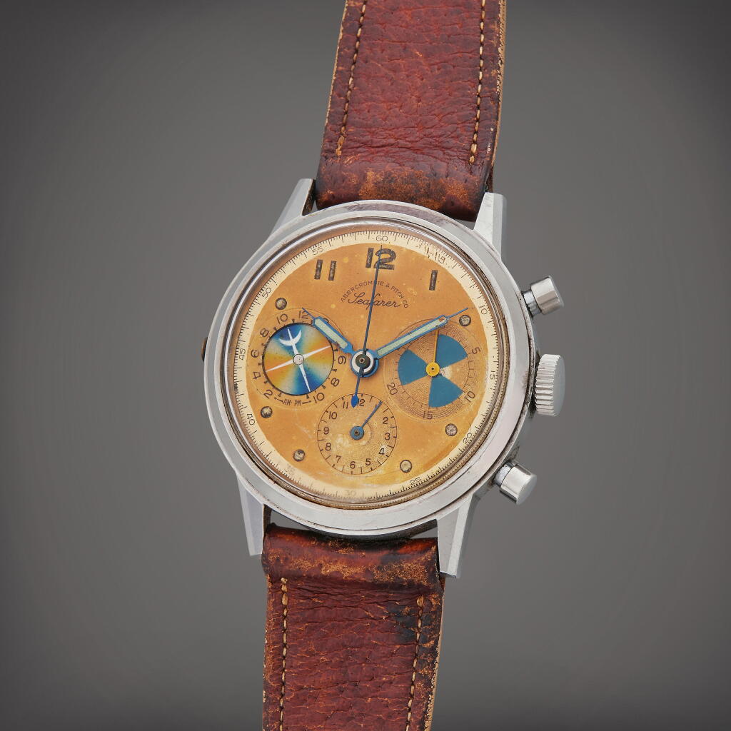 View full screen - View 1 of Lot 66. Reference 2443 Seafarer | Retailed by Abercrombie & Fitch Co: A stainless steel chronograph wristwatch with tide indicator, Circa 1955.