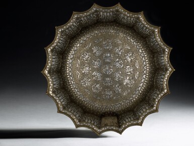 View full screen - View 1 of Lot 74. A rare and important Khurasan silver-inlaid brass basin, probably Herat, circa 1200.