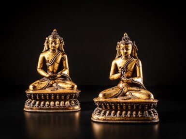 View full screen - View 1 of Lot 11. Two gilt-copper alloy figures of Amitabha and Vairocana, Tibet, 14th / 15th century | 十四 / 十五世紀 藏傳銅合金鎏金阿彌陀佛及大日如來佛坐像 一組兩件.