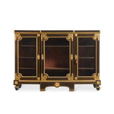View full screen - View 1 of Lot 1095. A fine Louis XIV style gilt-bronze mounted ebony and ebonized three-door library cupboard after a model by André-Charles Boulle, third quarter 19th century.
