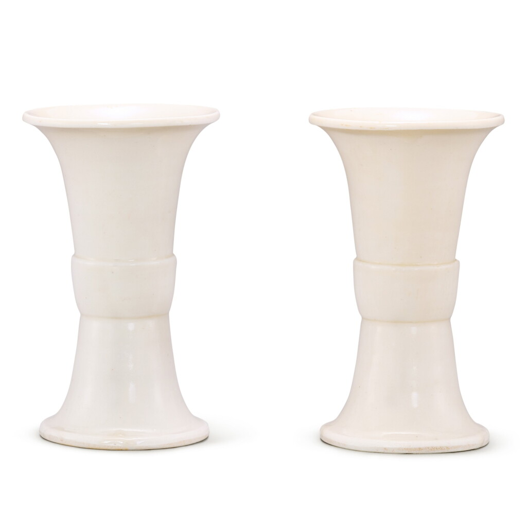 View full screen - View 1 of Lot 341. A PAIR OF DEHUA GU VASES 17TH CENTURY | 十七世紀 德化白釉花觚一對.