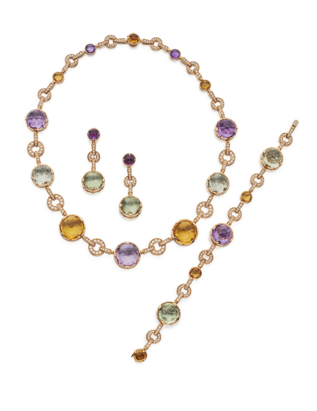 View full screen - View 1 of Lot 73. PINK GOLD, GEM-SET AND DIAMOND SUITE, BULGARI.