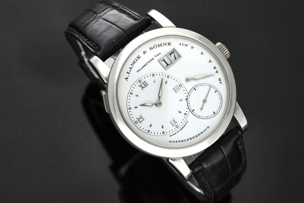 View full screen - View 1 of Lot 76. Reference 101.049 Lange 1 Cellini A limited edition platinum wristwatch with date and power reserve indication, made to commemorate the 25th anniversary of Cellini in 2002.