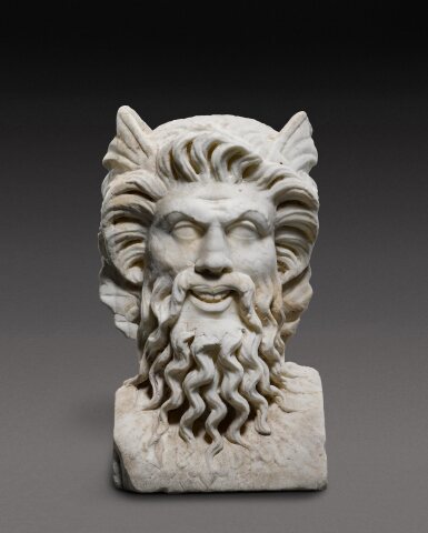 View full screen - View 1 of Lot 109. A Roman Marble Janiform Herm of a Young and Old Triton, circa 2nd Century A.D..