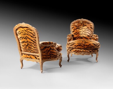 View full screen - View 1 of Lot 29. A pair of giltwood bergères à la reine, Louis XV, circa 1750, stamped I. AVISSE | Paire de bergères à dossier plat en bois doré d'époque Louis XV, vers 1750, estampillées I. AVISSE.