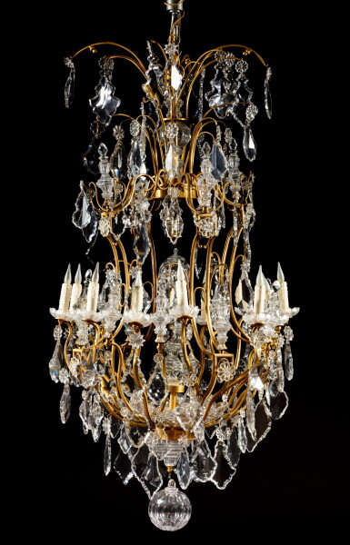 View full screen - View 1 of Lot 224. A pair of Louis XV style gilt-bronze and glass twelve-light chandeliers, by Henri Vian, second half 20th century | Paire de lustres à douze lumières en verre taillé et bonze doré de style Louis XV, par Henri Vian, seconde moitié du XXe siècle.