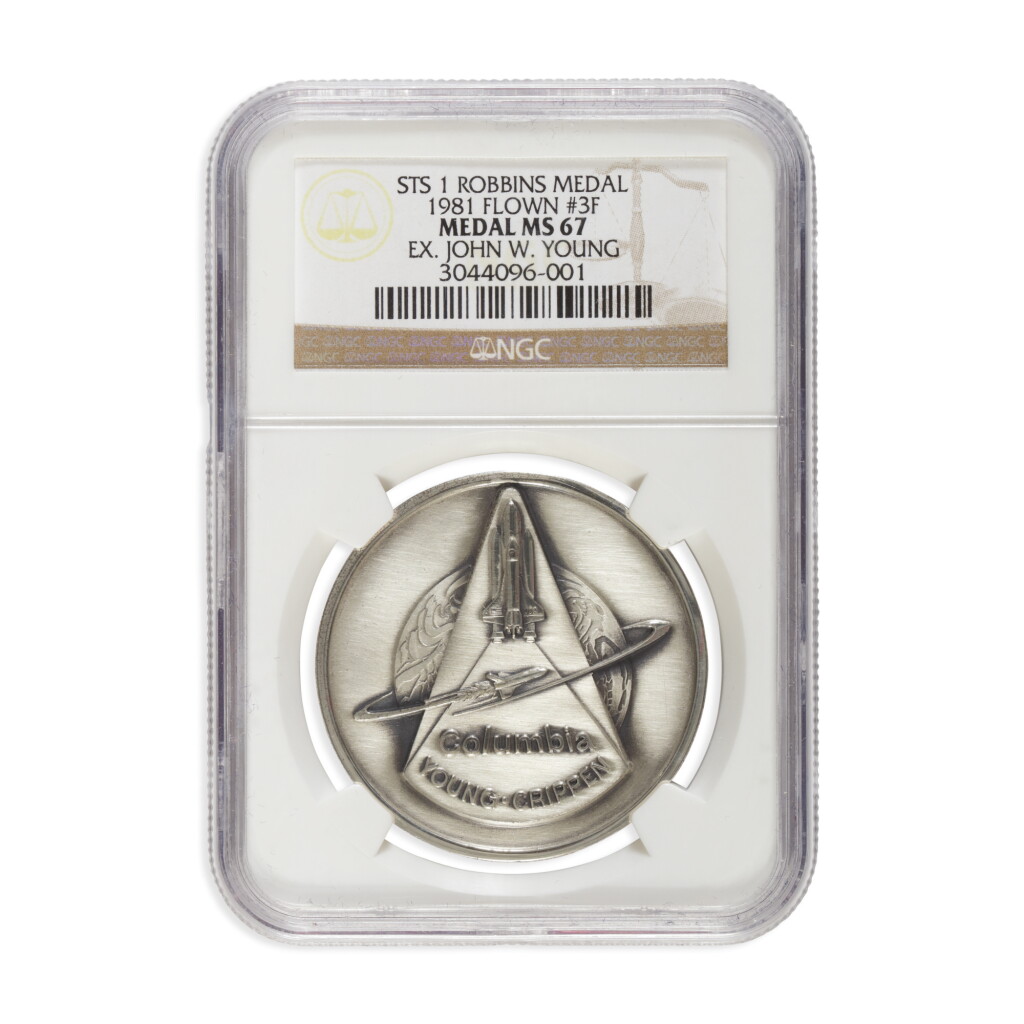 View full screen - View 1 of Lot 217. FLOWN ON THE SPACE SHUTTLE COLUMBIA (STS-1). COMMANDER JOHN YOUNG'S STS-1 SILVER ROBBINS MEDALLION.