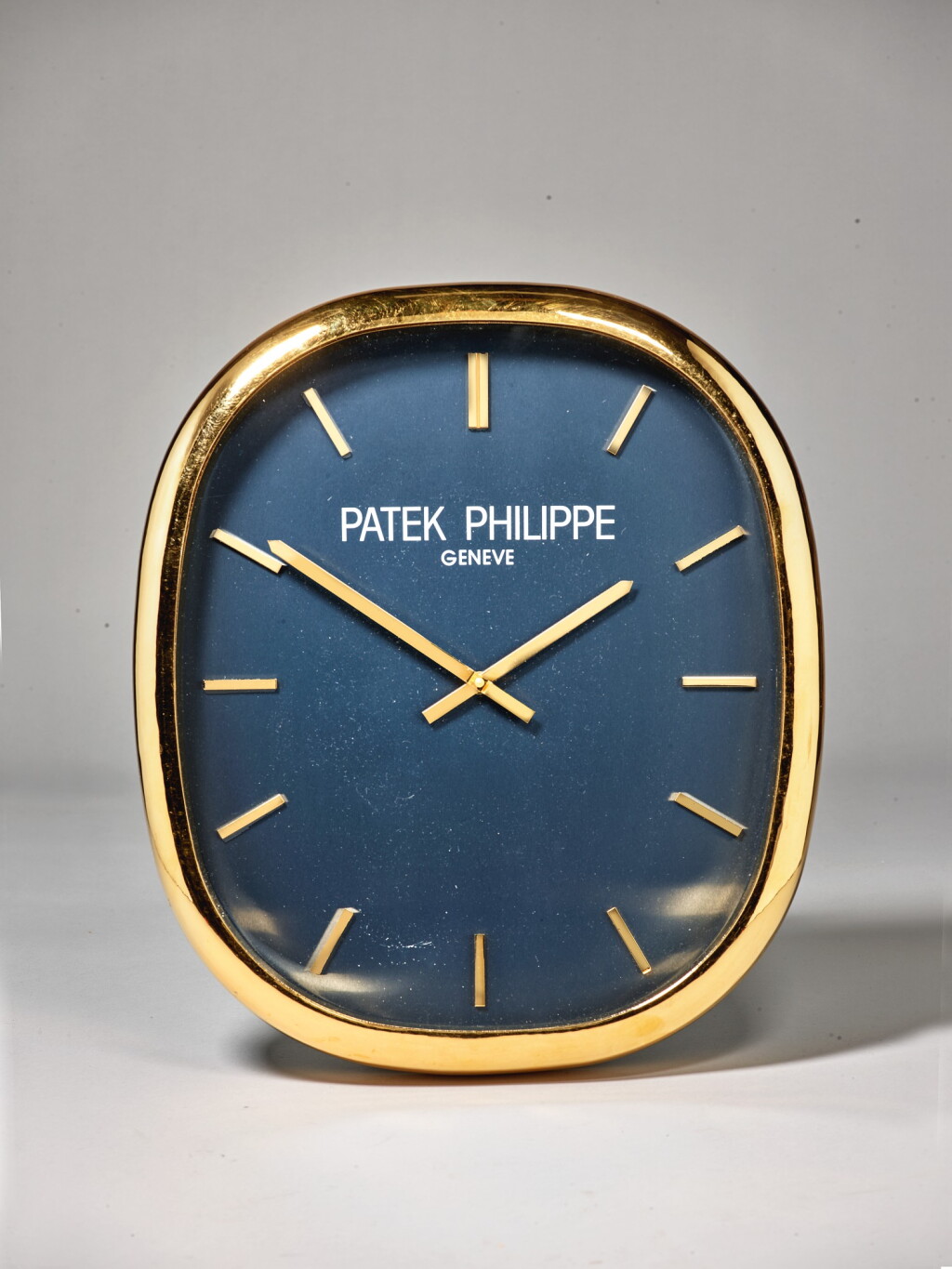 View full screen - View 1 of Lot 112. PATEK PHILIPPE | ELLIPSE A LARGE OVAL WALL CLOCK, CIRCA 1990.