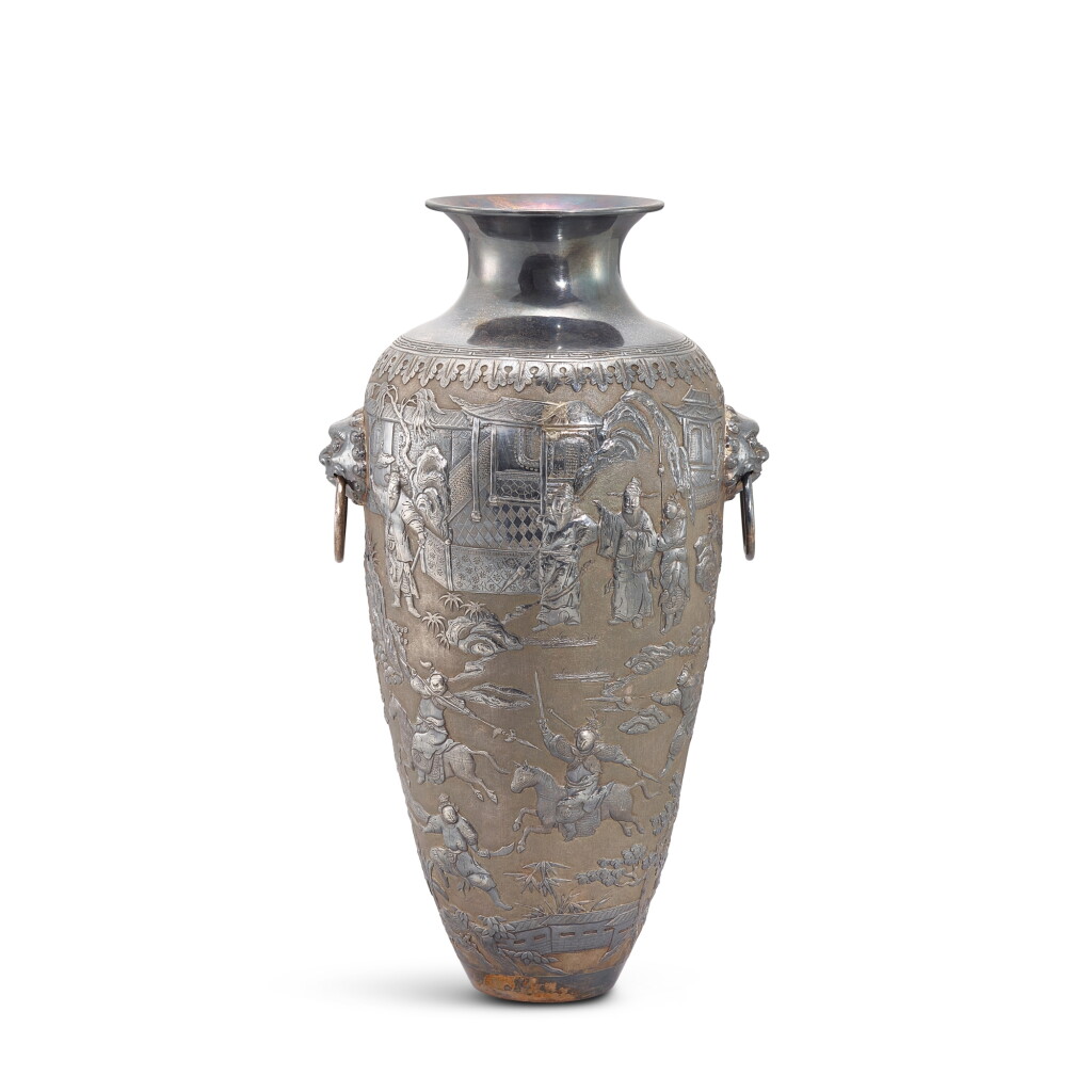 View full screen - View 1 of Lot 520. A large repoussé-decorated Chinese export silver vase, Qing dynasty, 19th century 清十九世紀 外銷銀舖首耳活環瓶.