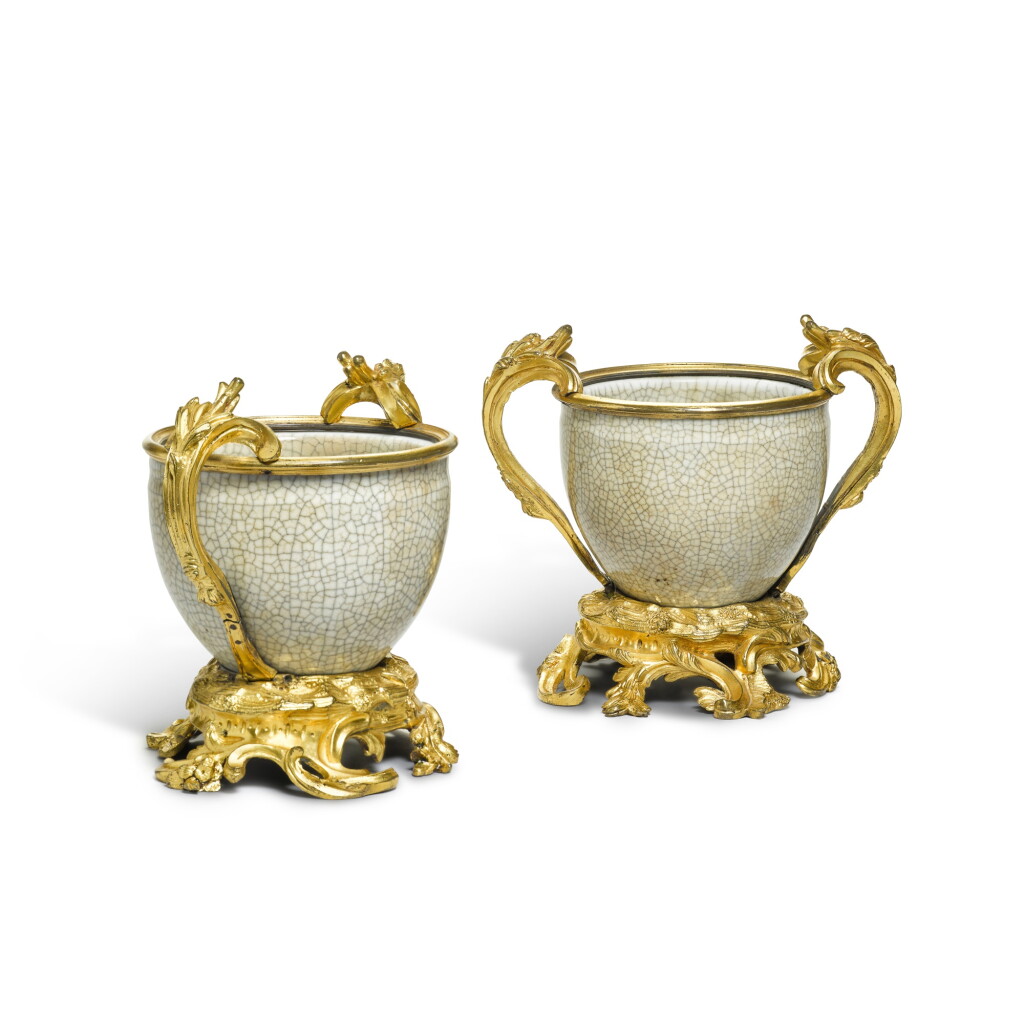 View full screen - View 1 of Lot 103. A pair of Louis XV gilt-bronze mounted Chinese crackle-glazed porcelain cache-pots, the mounts circa 1750, the porcelain 17th/18th century.