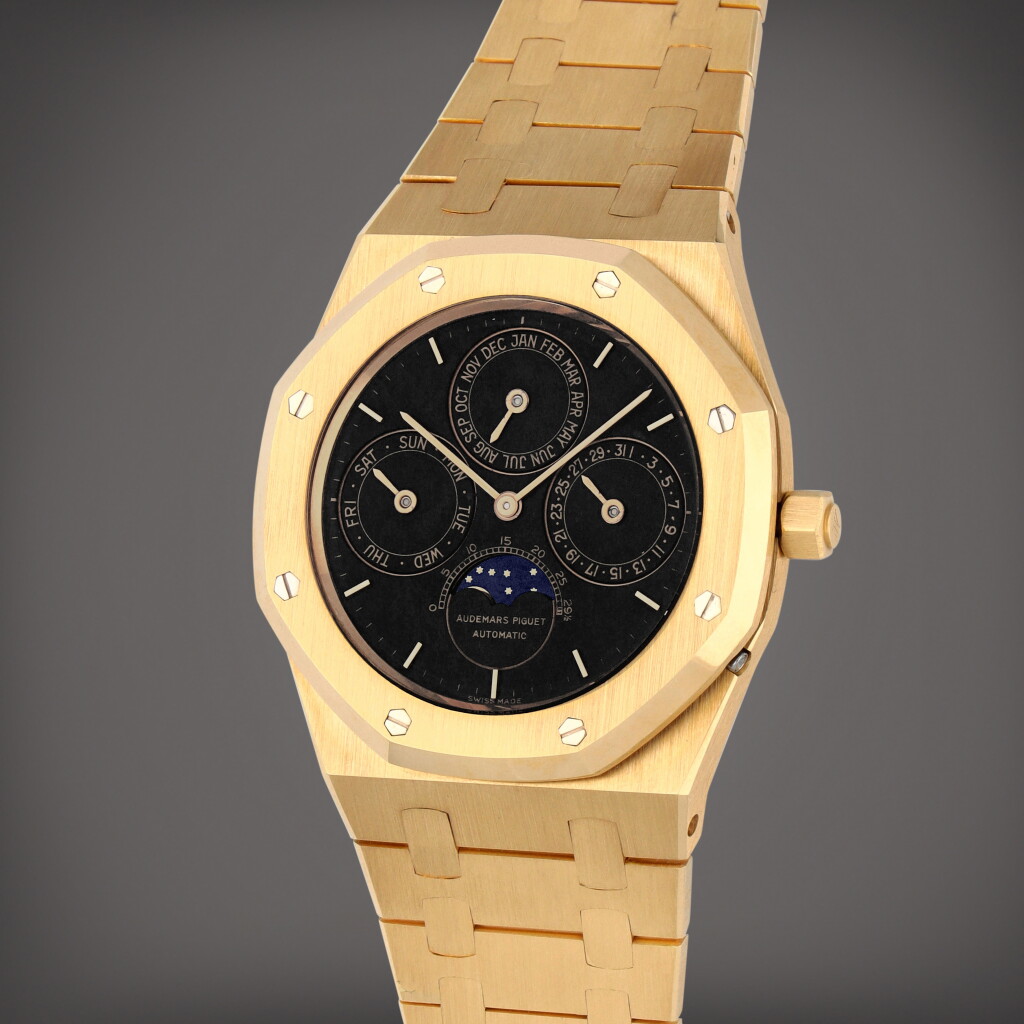 View full screen - View 1 of Lot 64. Royal Oak Quantième Perpetuel, Reference 25554BA | A yellow gold perpetual calendar wristwatch with moon phases and bracelet | Circa 1985.