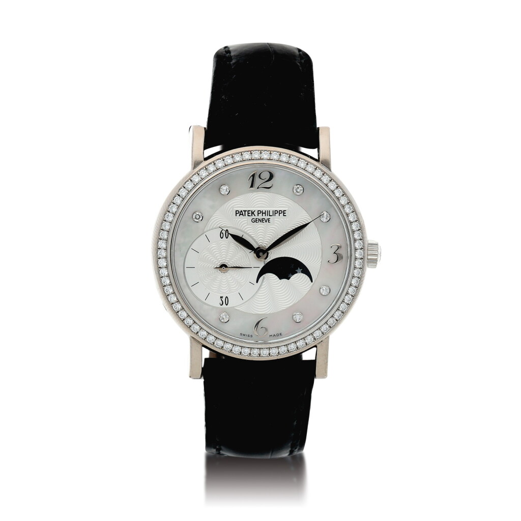 View full screen - View 1 of Lot 108. Reference 4958 Calatrava A white gold and diamond-set wristwatch with moon phases and mother-of-pearl dial, Made in 2008.