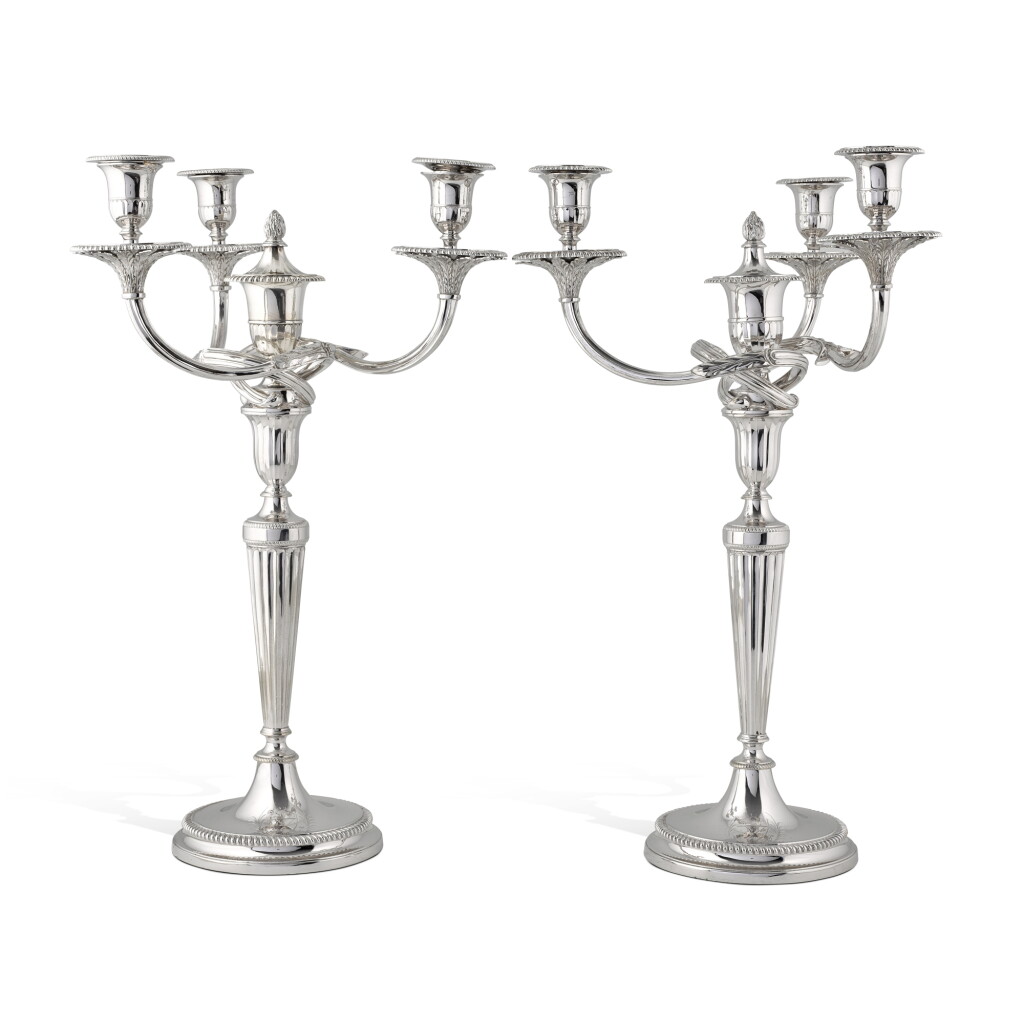View full screen - View 1 of Lot 141. A pair of George III silver three-light candelabra, John Scofield, London, 1785.