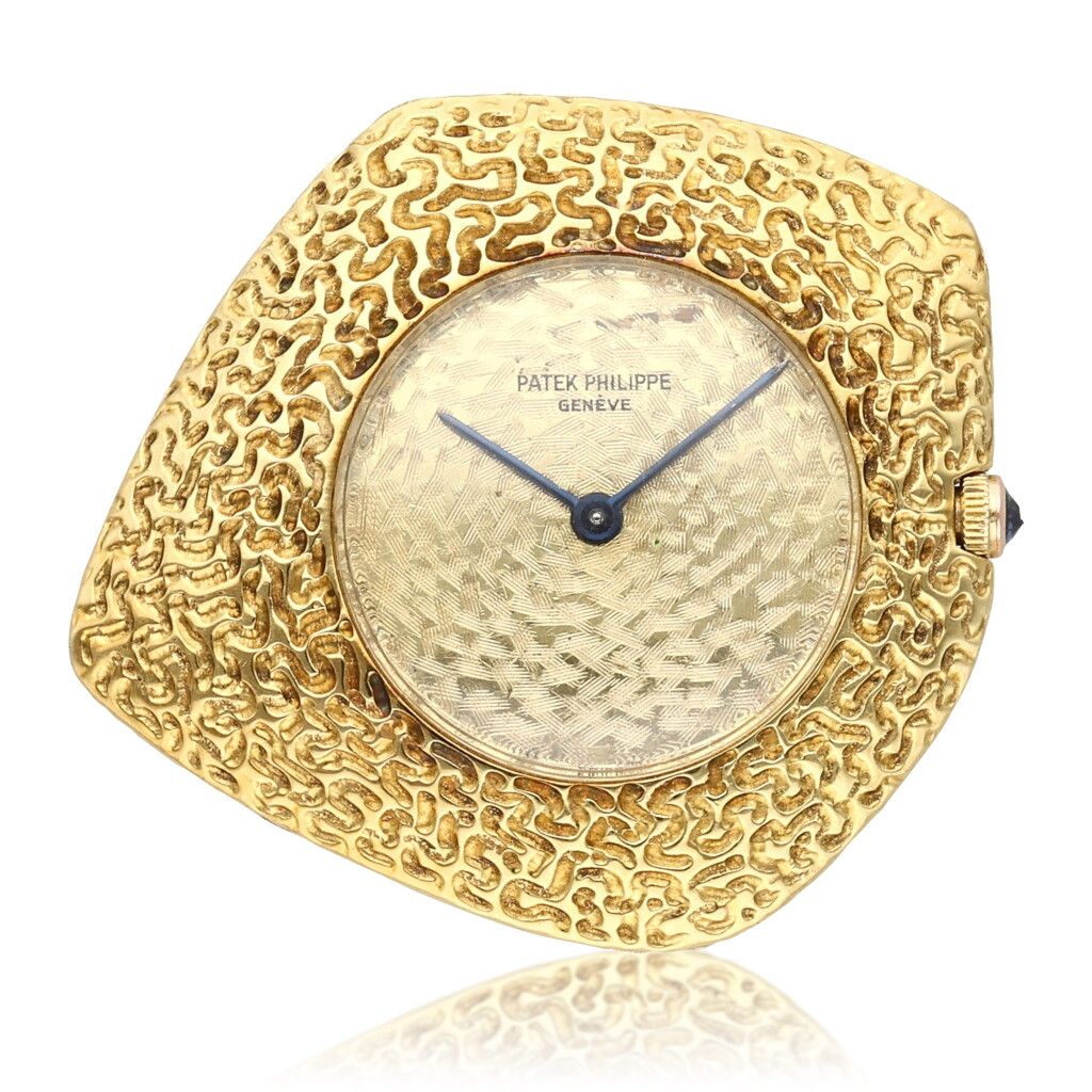 View full screen - View 1 of Lot 247. Reference 788/2 ‘Ricochet’ | A yellow gold asymmetrical open-faced watch, Designed by Gilbert Albert, Circa 1967.