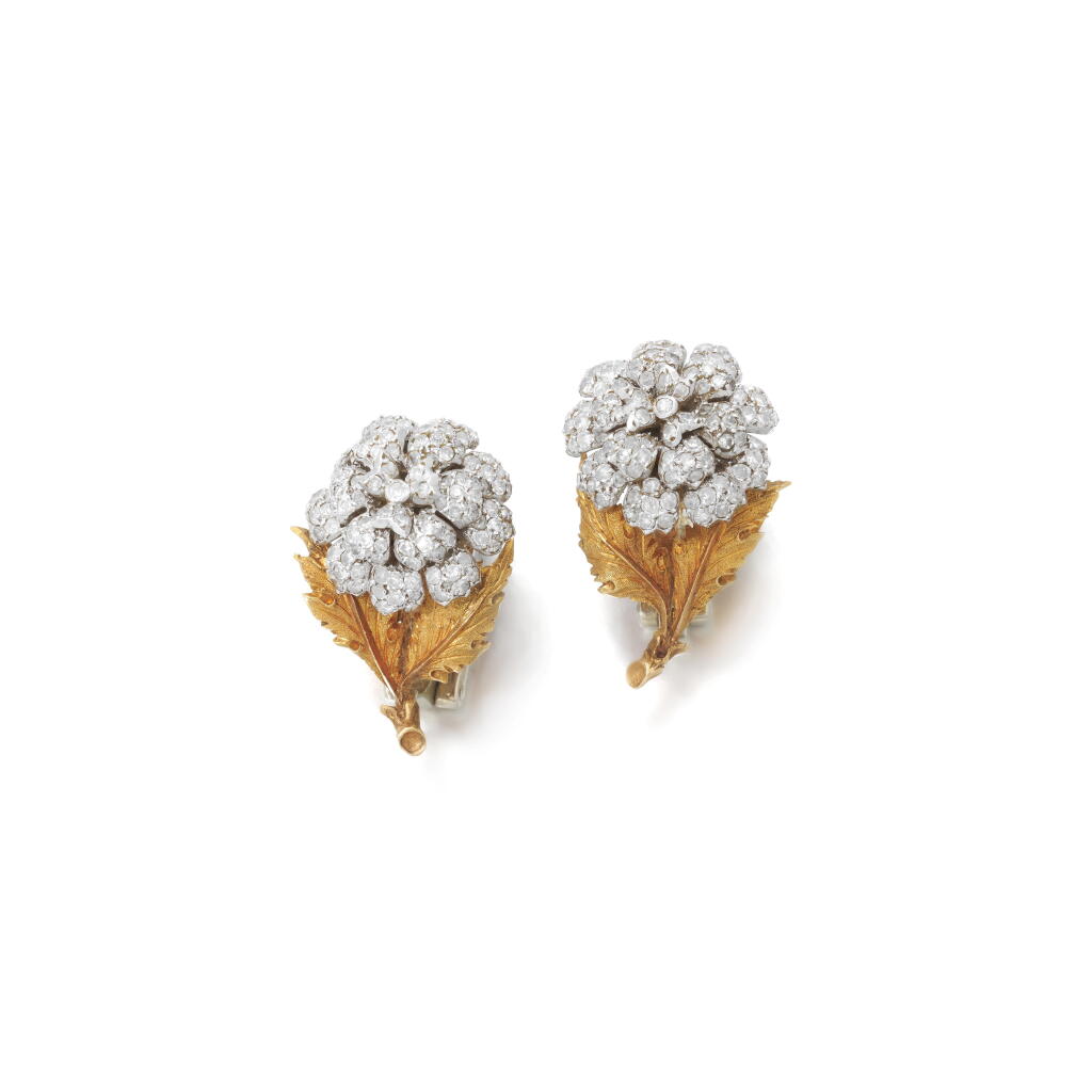 View full screen - View 1 of Lot 735. Pair of gold and diamond ear clips, mid-20th century.