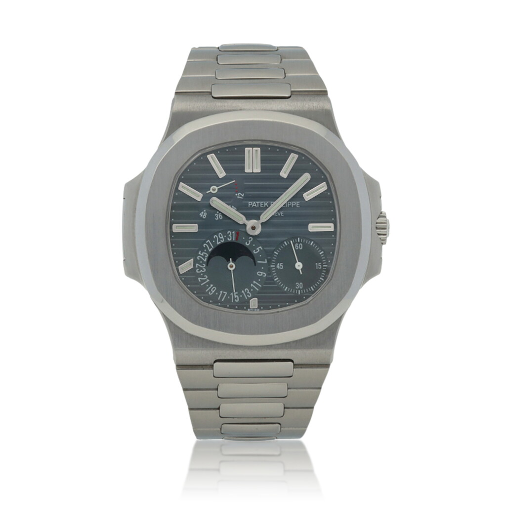 Voir en plein écran - Voir 1 du lot 99. 'Geneva Seal' Nautilus, ref. 5712/1A-001 Stainless steel wristwatch with date, moon phases, power reserve indication and bracelet Circa 2006 | 百達翡麗 | 5712/1A-001型號「'Geneva Seal' Nautilus」精鋼鍊帶腕錶備日期、月相及動力儲存顯示,年份約2006.