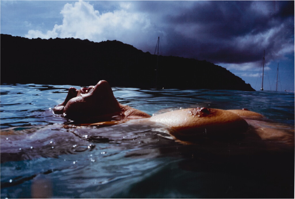 View full screen - View 1 of Lot 24. NAN GOLDIN | 'VALERIE FLOATING IN THE SEA, MAYREAU'.