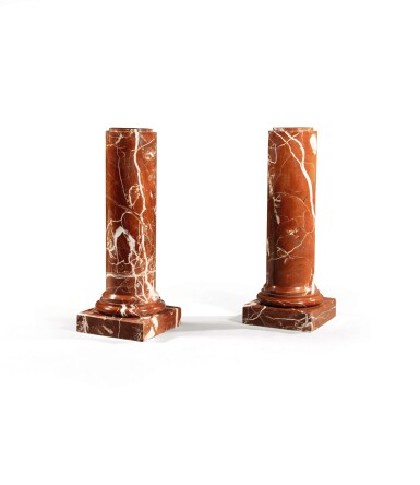 View full screen - View 1 of Lot 262. A pair of red marble stands, 20th century.