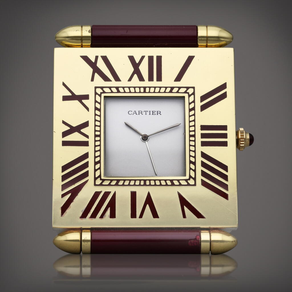 View full screen - View 1 of Lot 57. A brass and lacquer rectangular desk timepiece with alarm, Circa 1995.