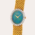 Reference 9821 D 3 | A yellow gold and diamond-set bracelet watch with opale dial | Circa 1970