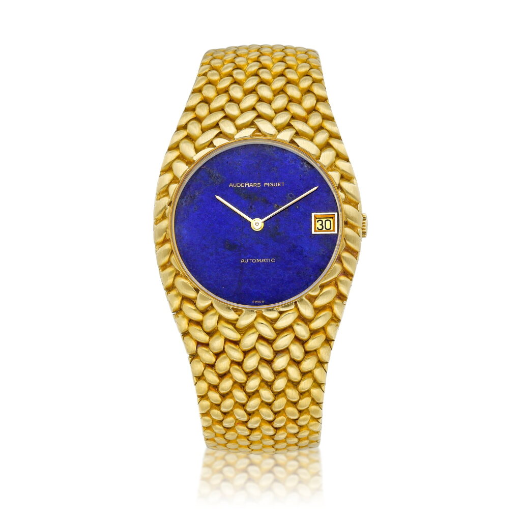 View full screen - View 1 of Lot 8877. A yellow gold bracelet watch with date and lapis lazuli dial, Circa 1975 | 愛彼 | 黃金鏈帶腕錶,備日期顯示及青金石錶盤,約1975年製.