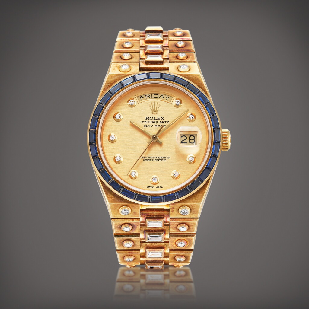 View full screen - View 1 of Lot 2103. Oysterquartz Day-Date, Reference 19168 | A yellow gold, diamond and sapphire-set wristwatch with day, date and bracelet, Circa 1985 | 勞力士 | Oysterquartz Day-Date 型號19168 | 黃金鑲鑽石及藍寶石鏈帶腕錶,備日期及星期顯示,約1985年製.