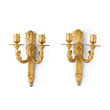 View full screen - View 1 of Lot 234. A pair of gilt bronze two-light wall lights, Louis XVI, circa 1775 Paire d'appliques à deux lumières en bronze doré d'époque Louis XVI, vers 1775.