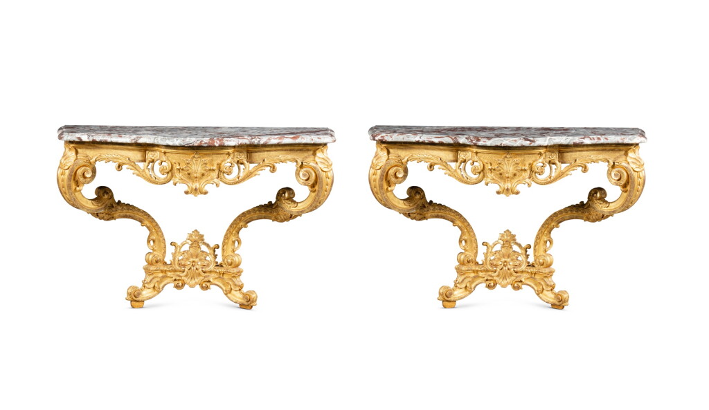 View full screen - View 1 of Lot 358. A pair of Régence giltwood consoles, in the manner of Jules Degoullons, circa 1720 | Paire de consoles en bois doré d'époque Régence, à la manière de Jules Degoullons, vers 1720.