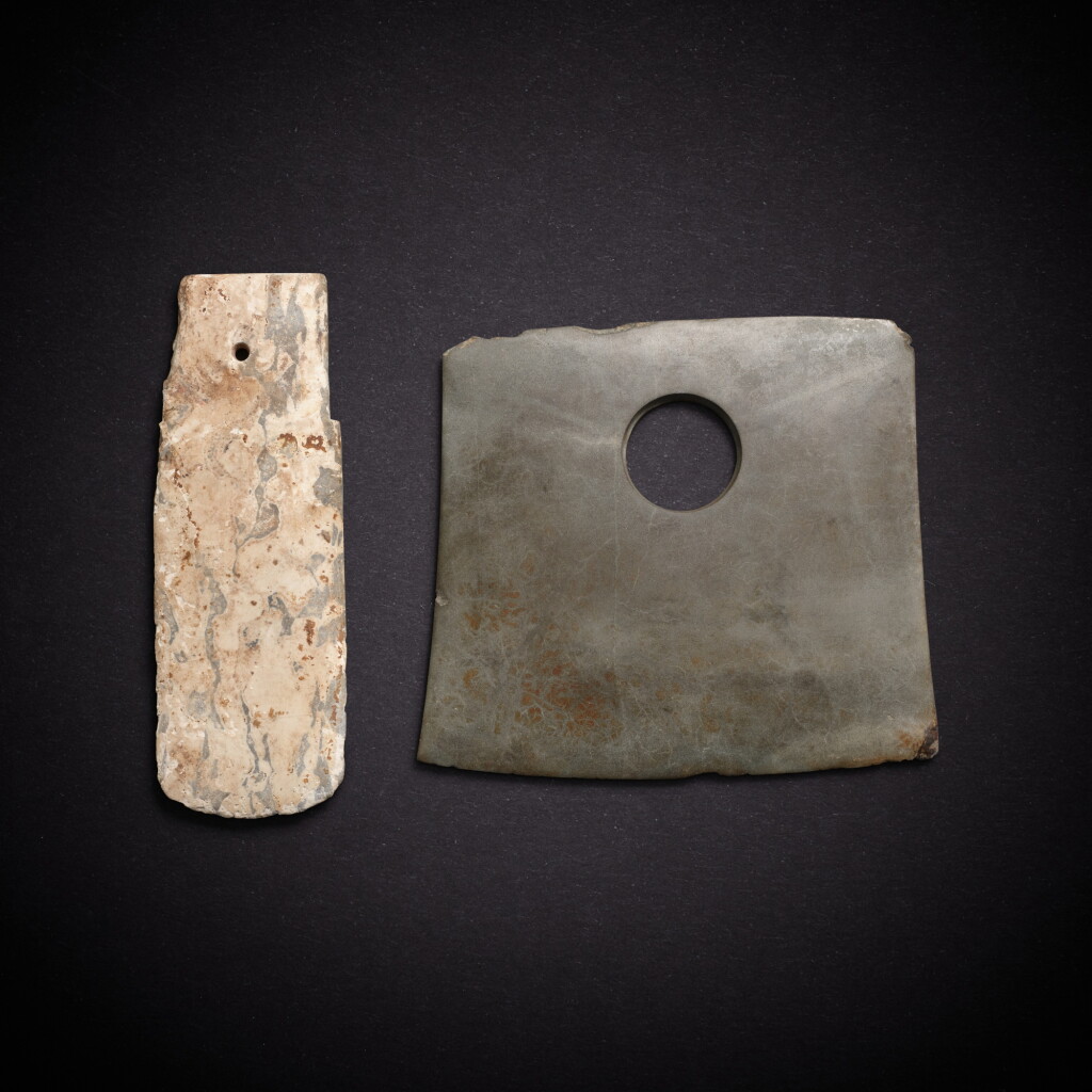 View full screen - View 1 of Lot 7824. A jade axe and a stone axe, Neolithic period - Shang dynasty | 新石器時代至商 玉鏟及石斧.