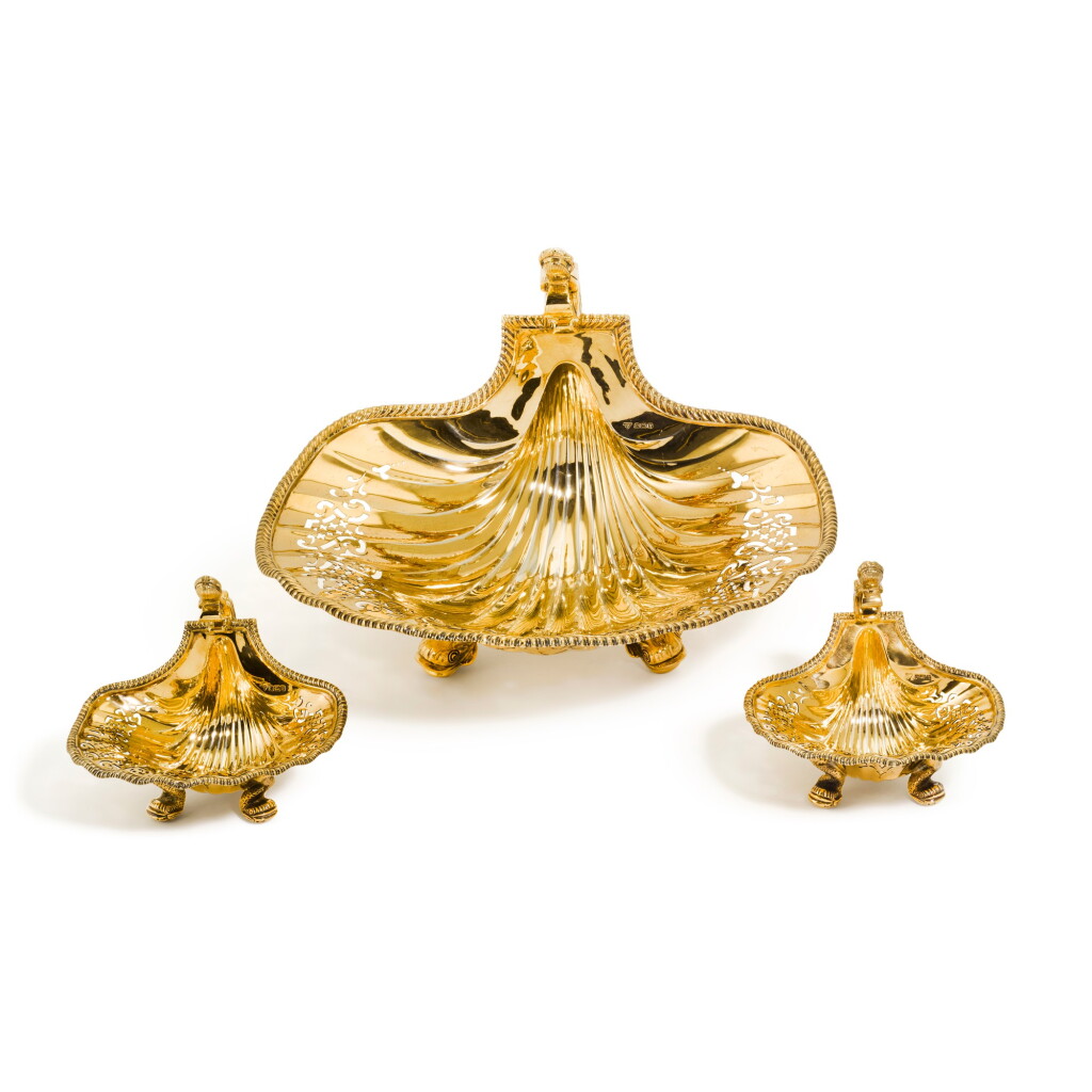 View full screen - View 1 of Lot 123. A Set of three silver-gilt baskets, Garrard & Co. Ltd., Sheffield, 1987.