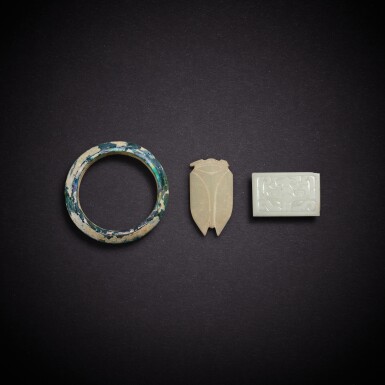 View full screen - View 1 of Lot 7906. Three glass ornaments, Eastern Zhou dynasty - Northern dynasties | 東周至北朝 琉璃器三件.