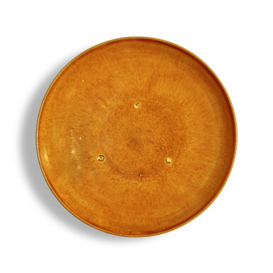 View full screen - View 1 of Lot 1227. An amber-glazed dish, Liao dynasty | 遼 琥珀釉盤.