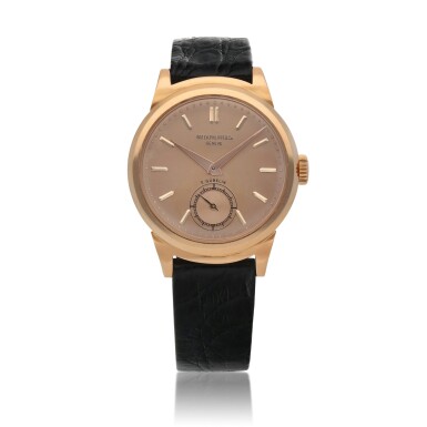 View full screen - View 1 of Lot 77. Retailed by Gübelin: 'Scroll Lugs' Calatrava, Ref. 1491, Pink gold wristwatch with scroll lugs Made in 1946 | 百達翡麗 | 零售商為Gübelin:1491型號「'Scroll Lugs' Calatrava」粉紅金腕錶,1946年製.