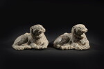 A pair of archaic bronze 'tiger' mat weights, Han dynasty
