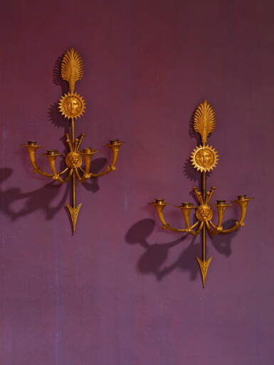 View full screen - View 1 of Lot 62. A pair of Empire gilt-bronze three-light wall-lights, attributed to Claude Galle, early 19th century | Paire d’appliques Empire à trois lumières en bronze doré, attribué à Claude Galle, début du XIXe siècle.