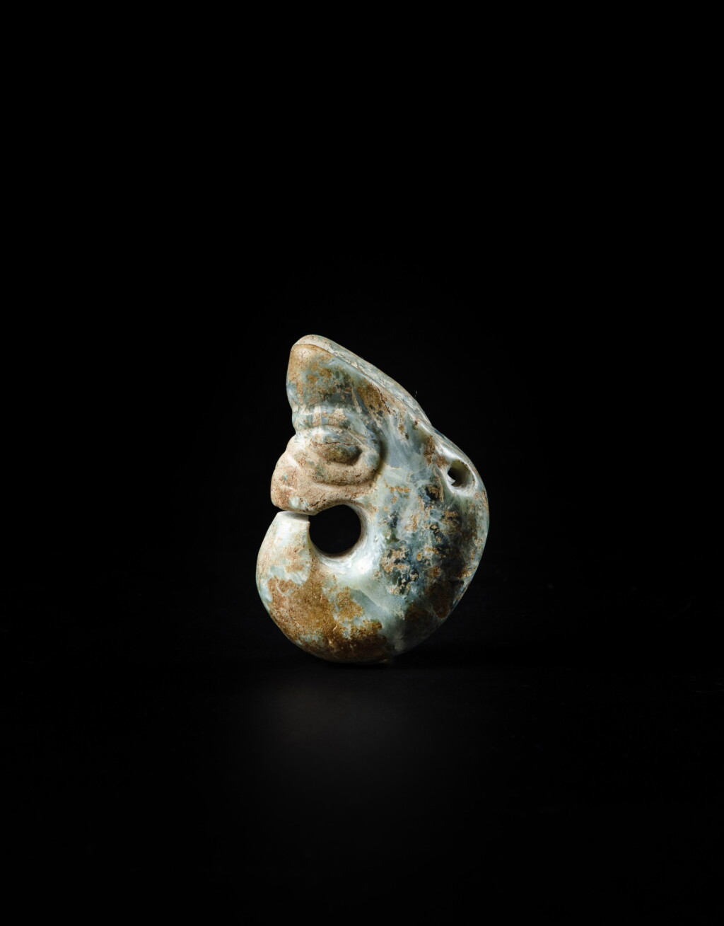 View full screen - View 1 of Lot 90. A partly calcified celadon jade ‘pig dragon’, zhulong, Neolithic period, Hongshan culture | 新石器時代 紅山文化青白玉豬龍.